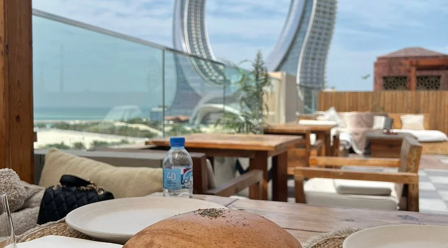 Outdoor seating area at The House Lusail in Lusail, Qatar