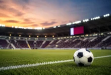 Qatar Football Association stadium during a football match showcasing virtual advertising technology on digital pitch-side boards in Qatar.