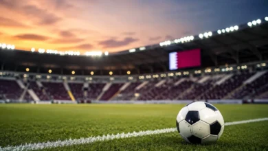 Qatar Football Association stadium during a football match showcasing virtual advertising technology on digital pitch-side boards in Qatar.