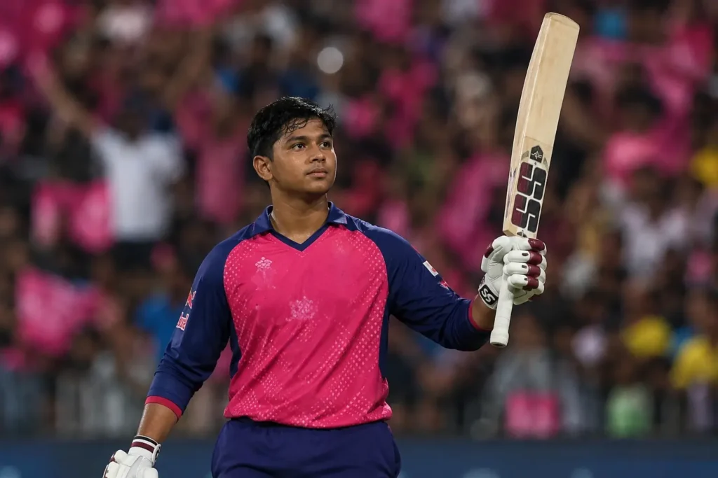 Vaibhav Sooryavanshi celebrating an IPL century under stadium lights.