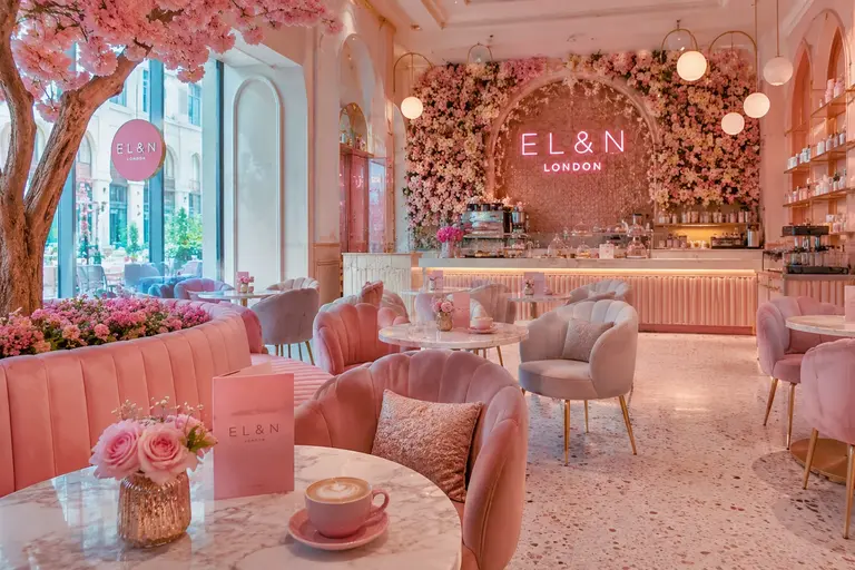 EL&N London cafe in Msheireb Downtown Doha featuring elegant pink interiors, floral decor, and a trendy Instagram-worthy atmosphere.