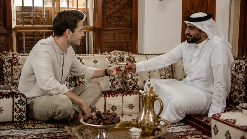 Tourist respectfully experiencing local culture in Qatar